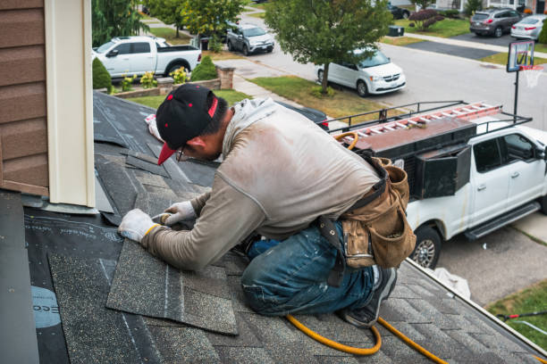 Professional Roof Repair technician working in Newtonville, NY